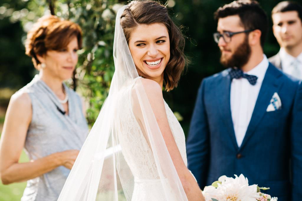 Zoe's veil catches the wind during her wedding to Daniel at Woodinville Lavender Farm, Washington, summer 2016