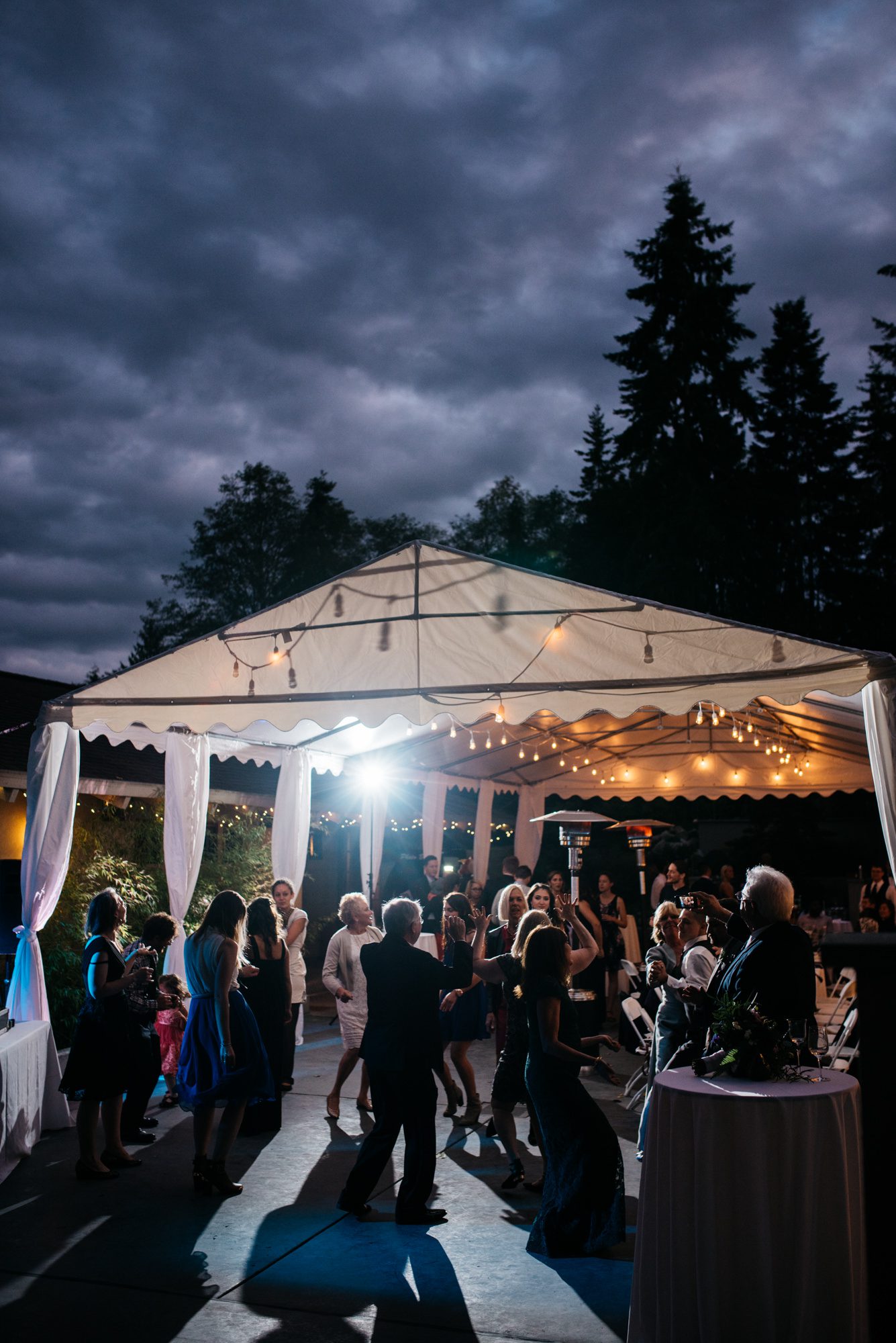 Guests celebrating and dancing at Katherine and Graeme's wedding reception at Kingston House, WA.