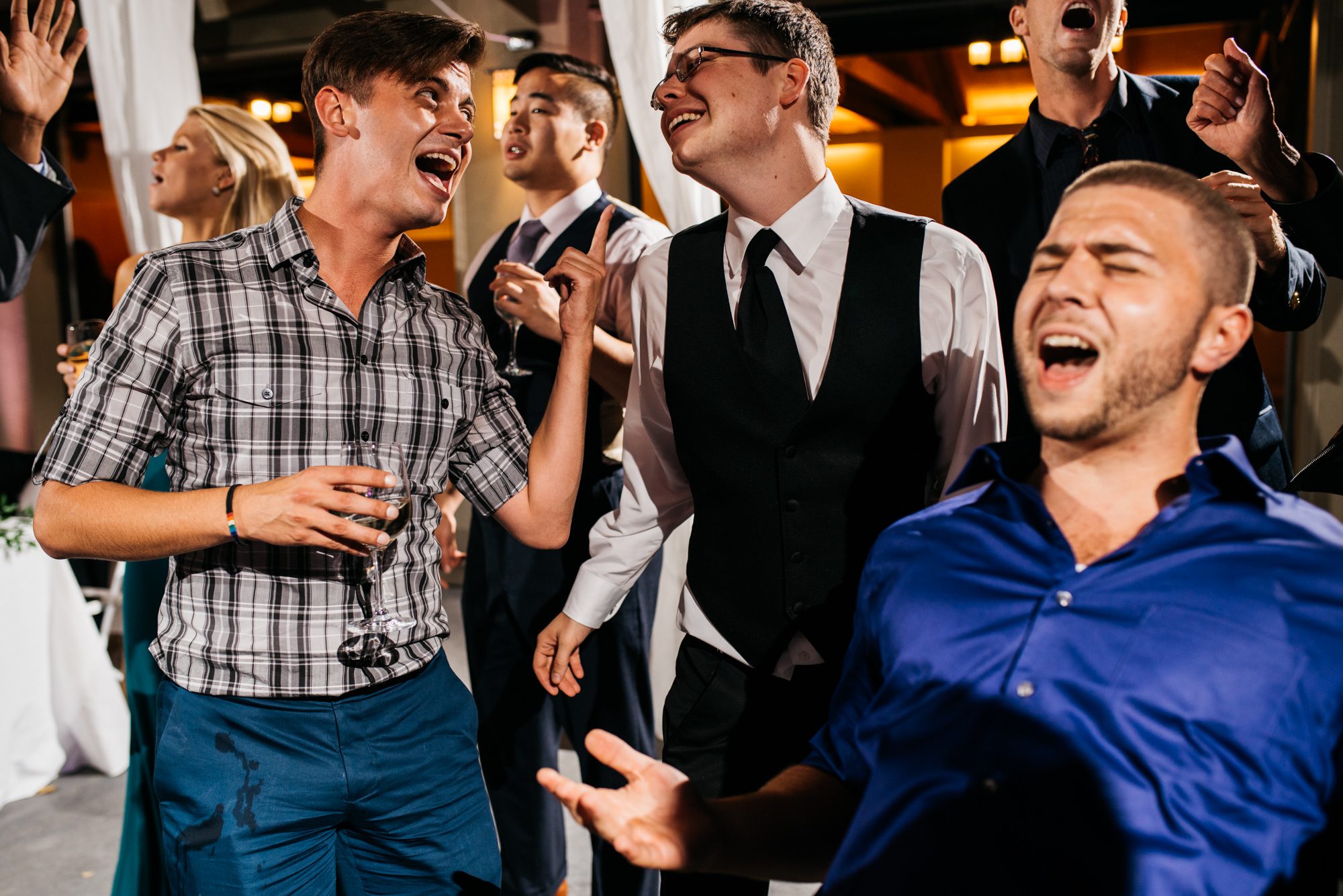 Guests celebrating and dancing at Katherine and Graeme's wedding reception at Kingston House, WA.