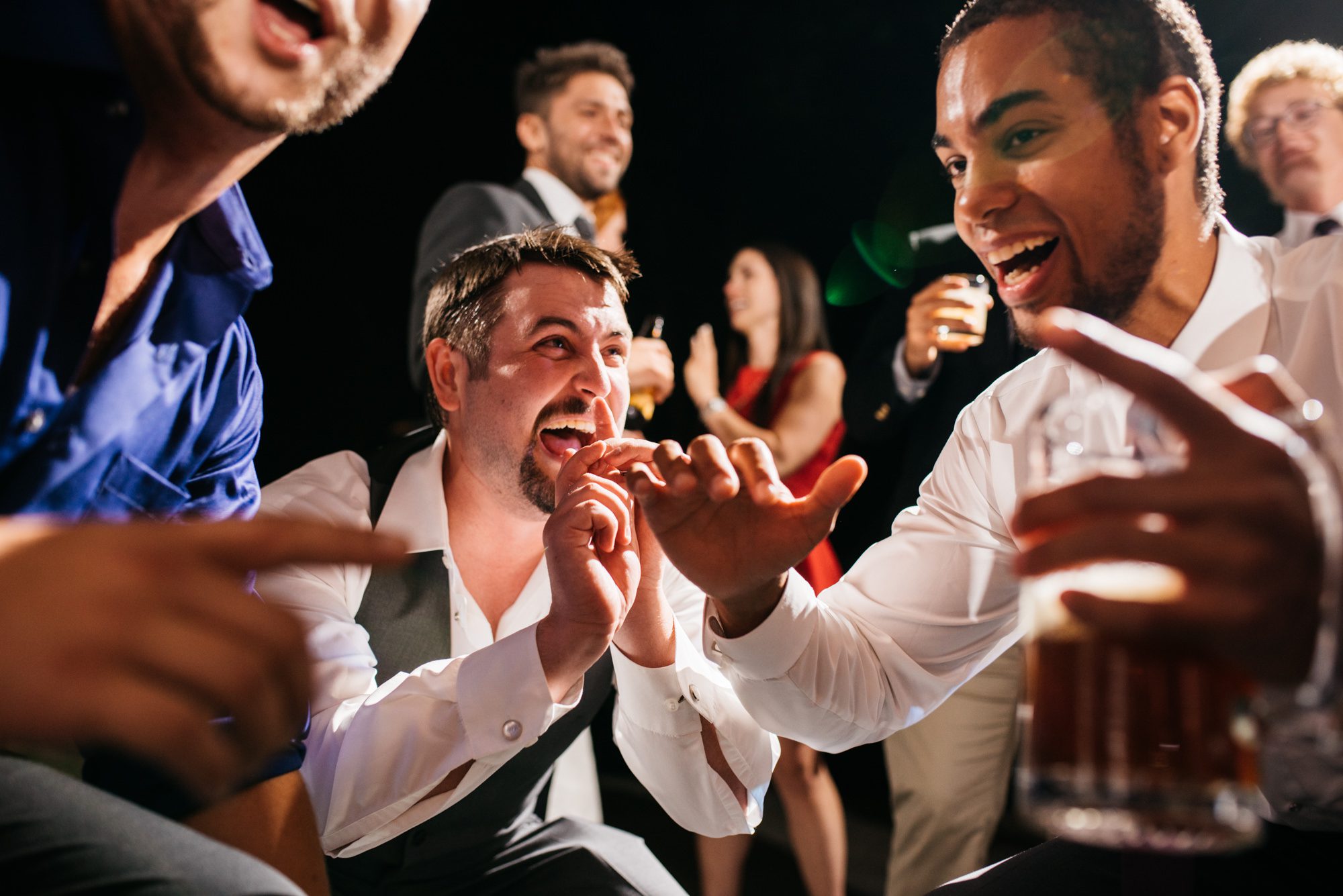 Guests celebrating and dancing at Katherine and Graeme's wedding reception at Kingston House, WA.