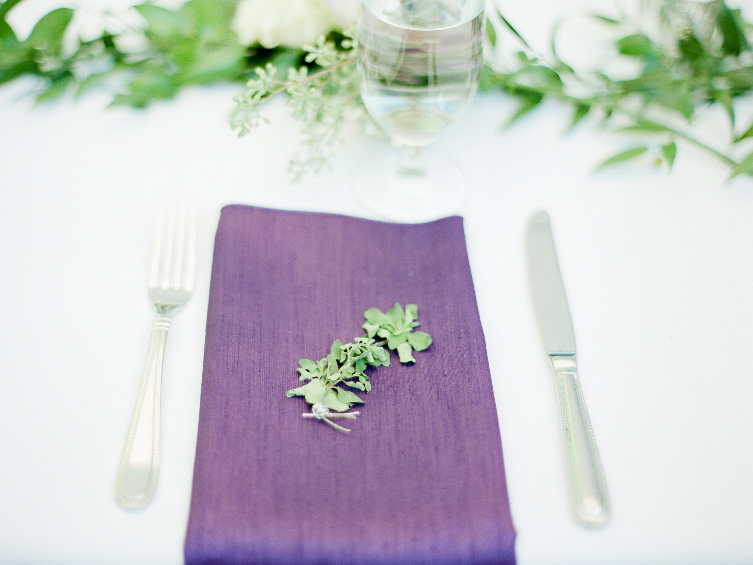 Unique idea of placing a sprig of herb to organize tables at Katherine and Graeme's wedding at Kingston House.