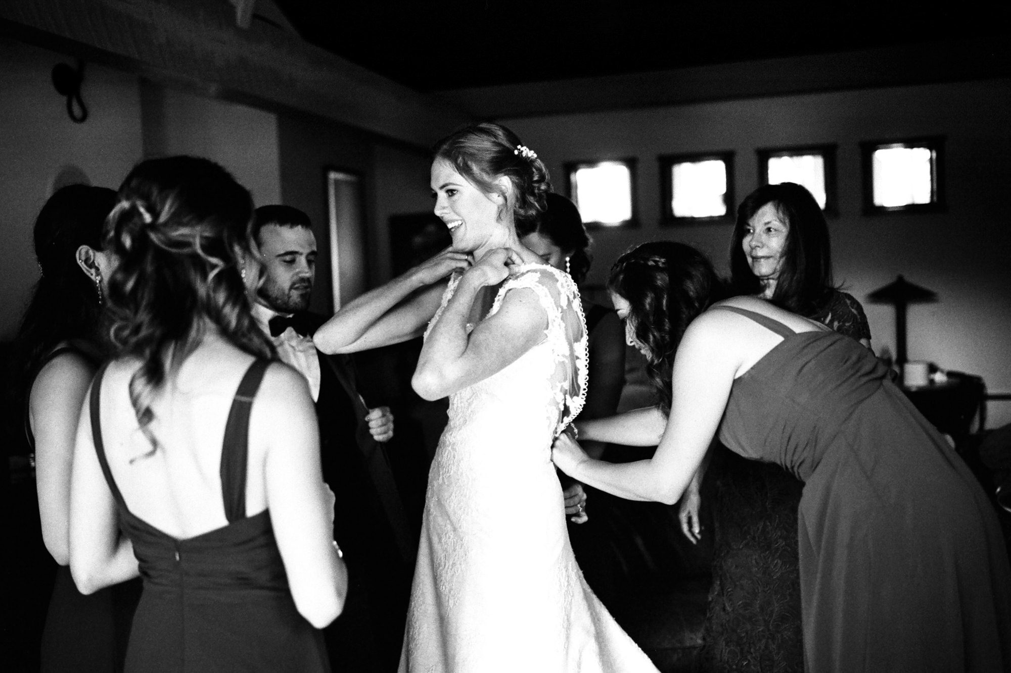 Katherine getting ready with her bridesmaids at Kingston House, a wedding venue in Kingston, Washington.