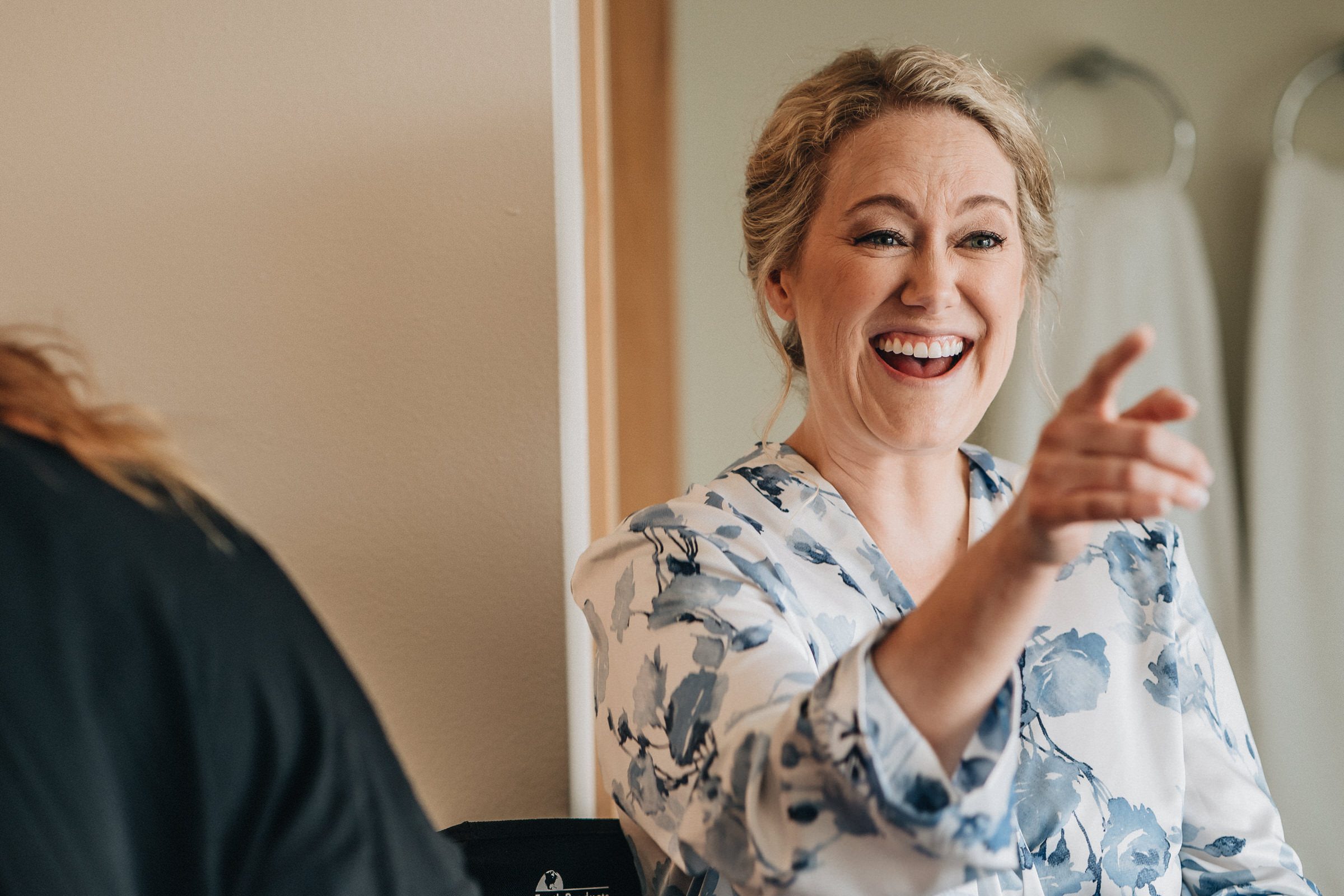 Boatyard Inn Weddings on Whidbey Island: Sara is tickled her mom is getting teary.