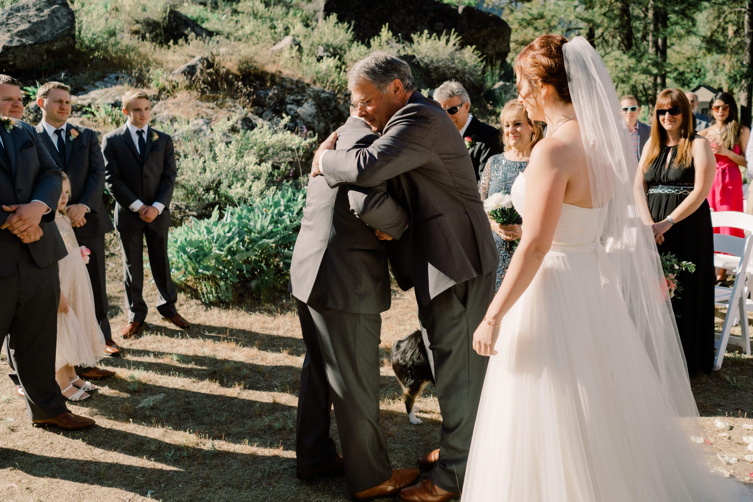 Sleeping Lady Resort weddings: Russ and Kristen's dad hug