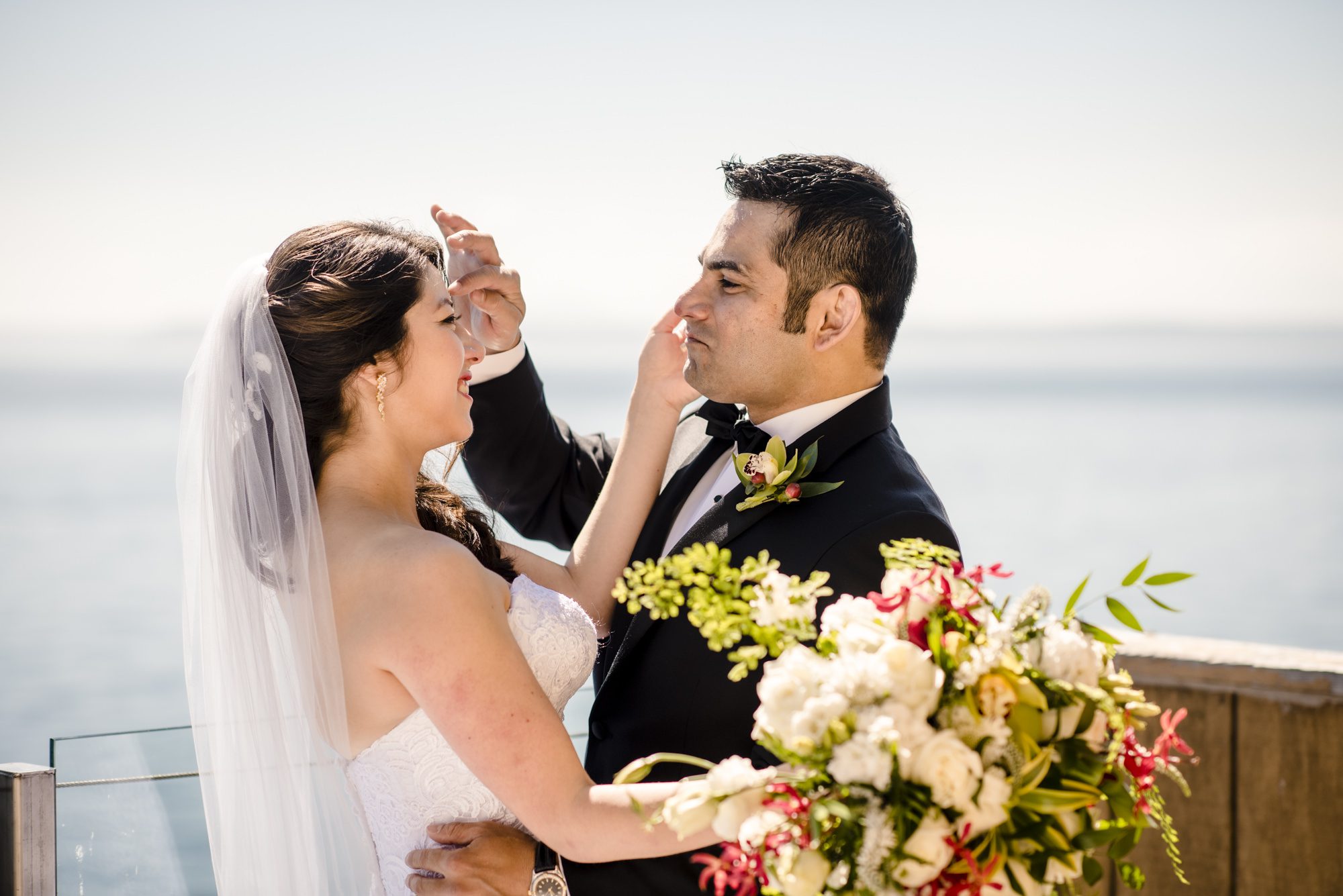Kelly and Ash First Look at The Edgewater. Photo by Jenn Tai, Seattle Wedding Photographer.