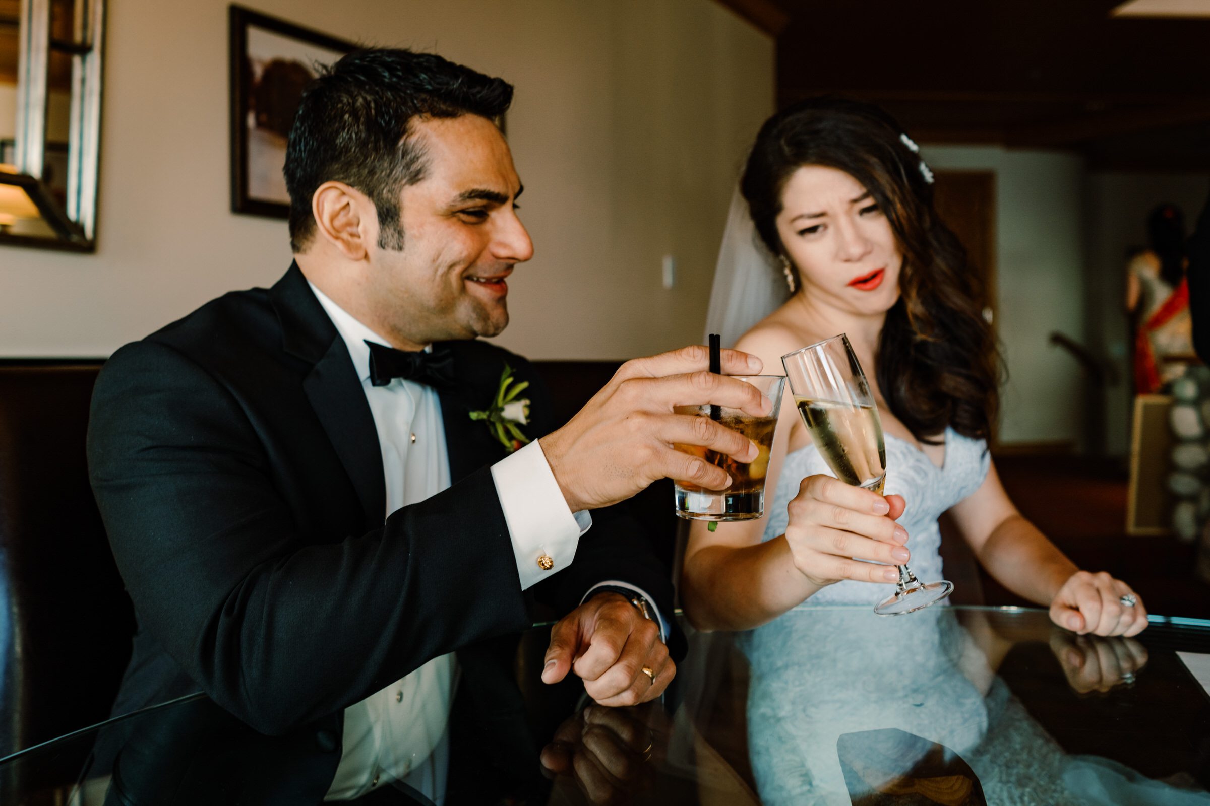 Bride Kelly toasts groom Ash before signing their papers