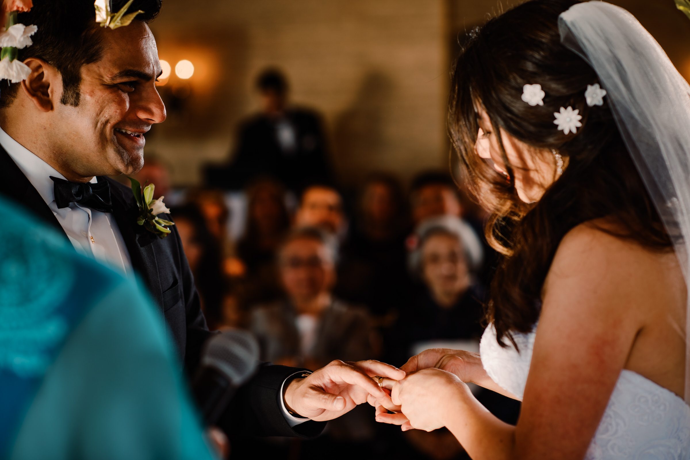 The exchange of rings at Kelly and Ash's wedding at The Edgewater