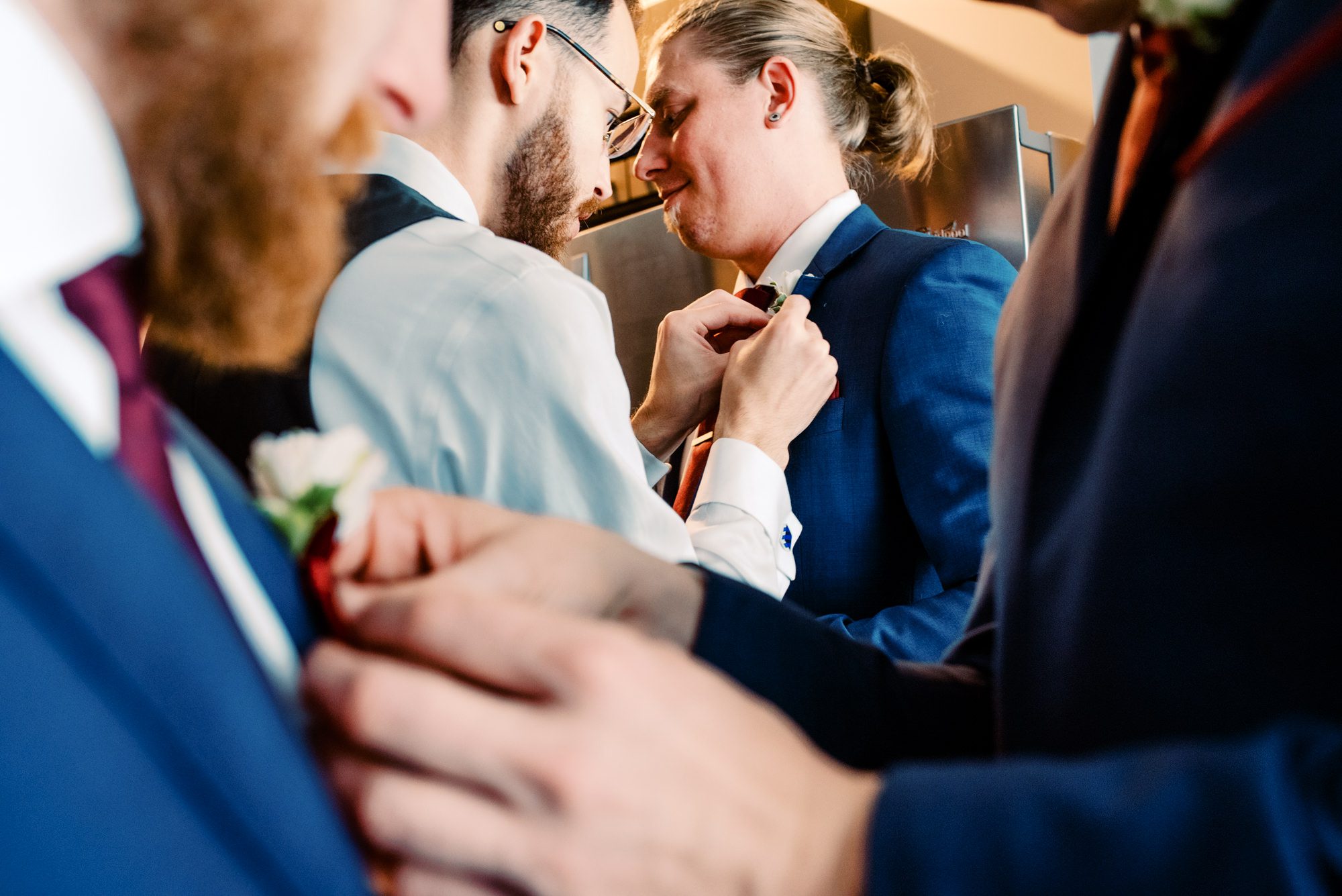 Groomsmen getting ready at Lauren and Kyle's wedding
