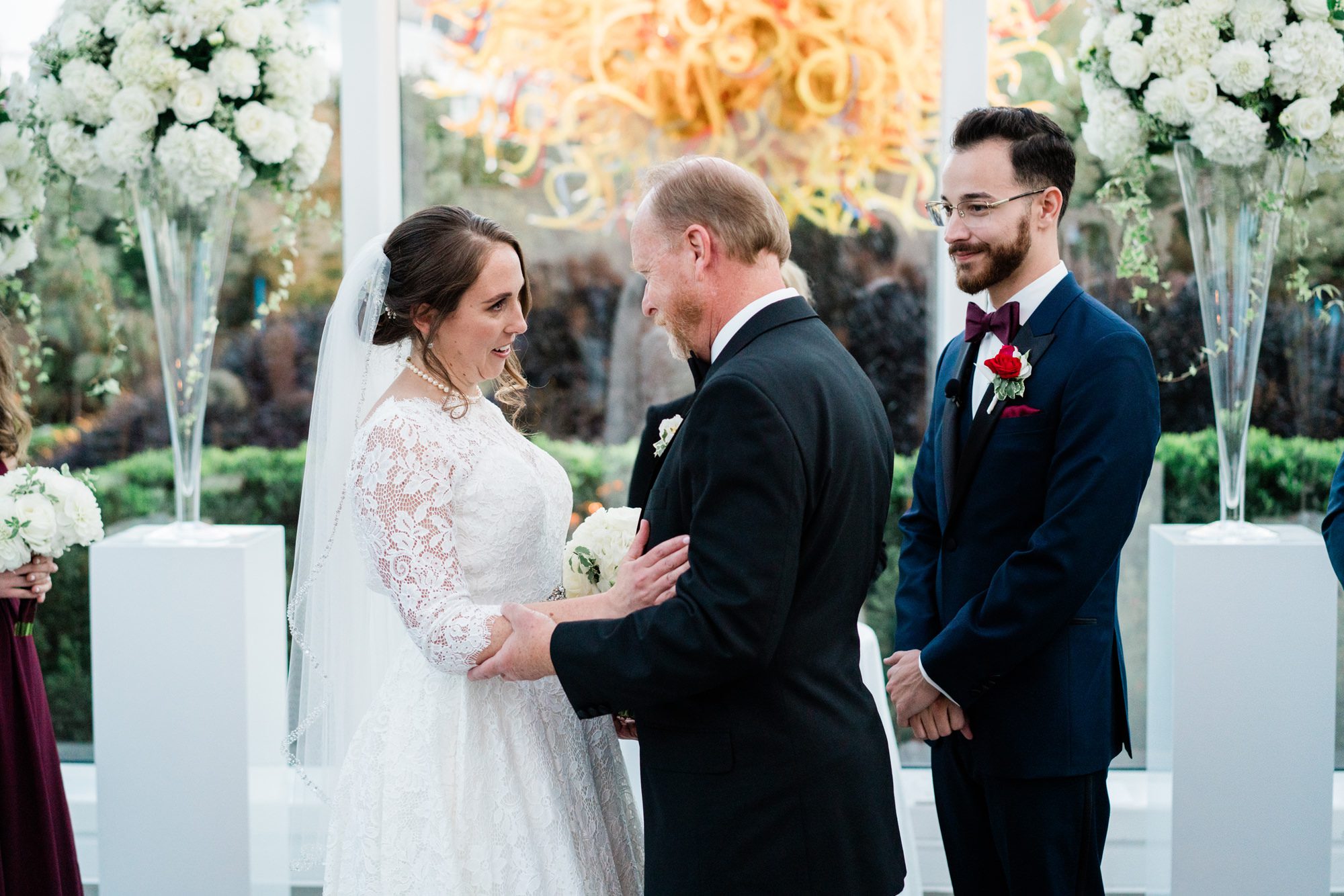 Bride Lauren her dad exchange a moment at her wedding to Kyle