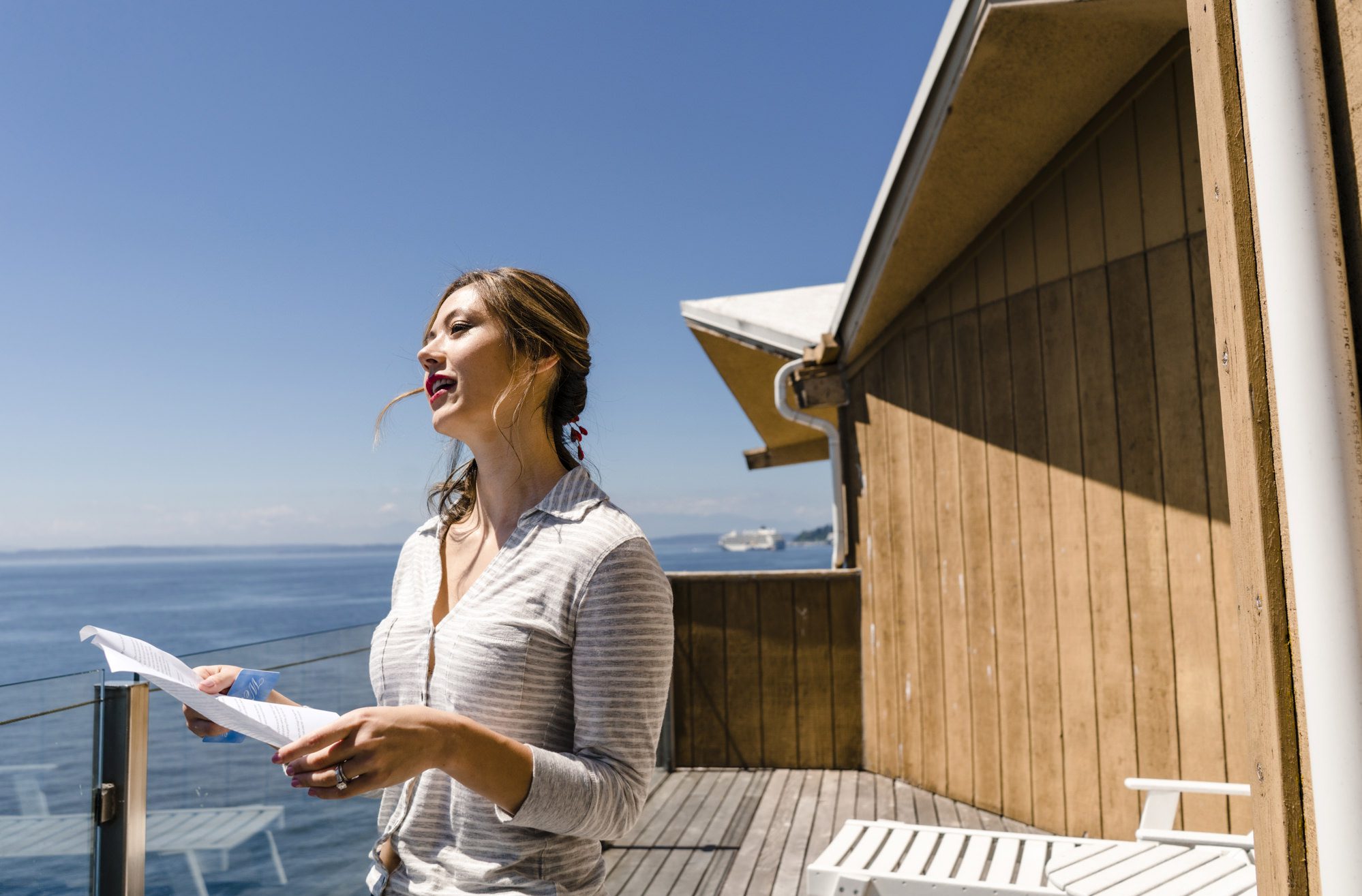 Kelly's sister practising her toast. Photo by Jenn Tai, Seattle wedding photographer
