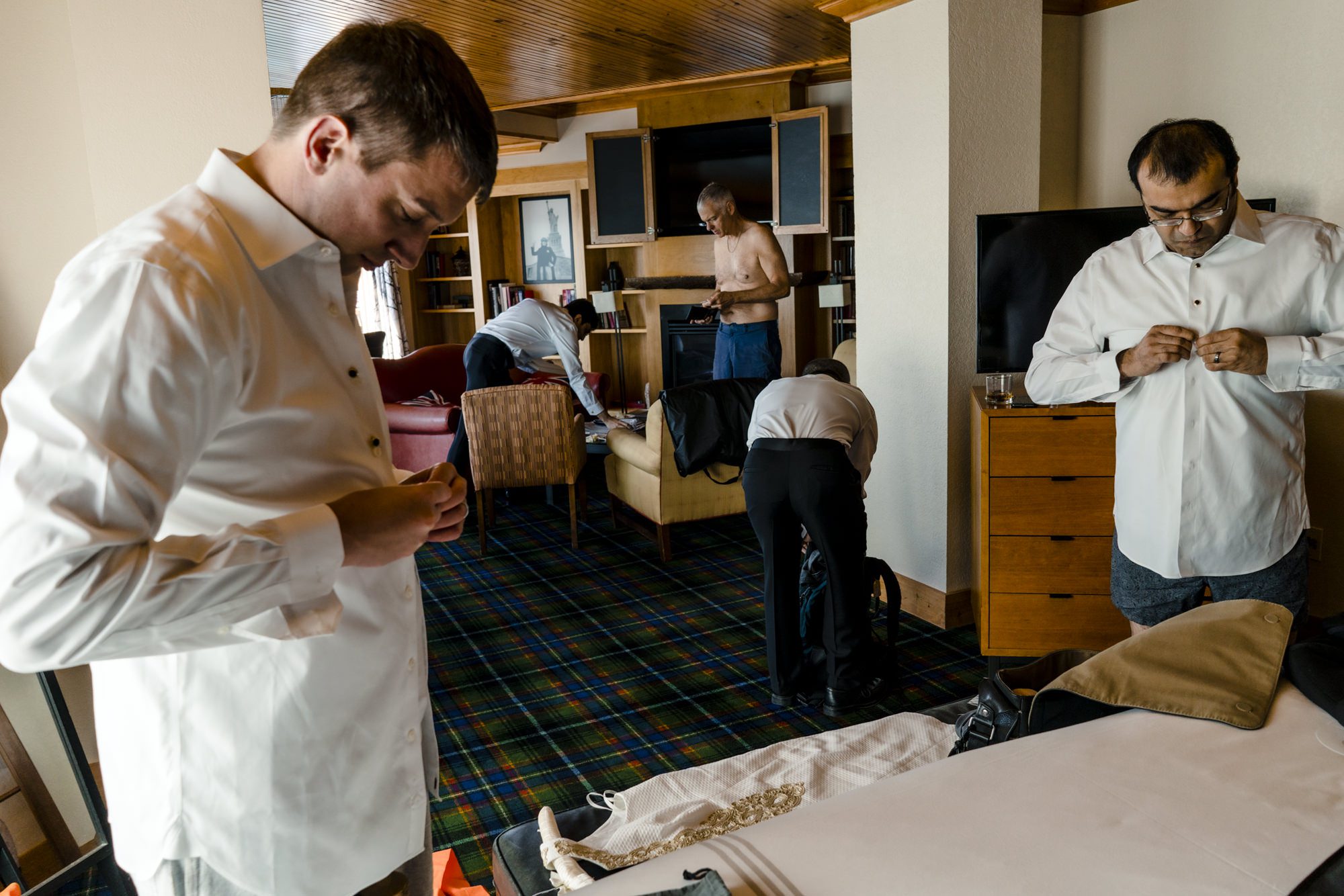 Groomsmen getting ready at the Edgewater, photo by Jenn Tai, Seattle wedding photographer