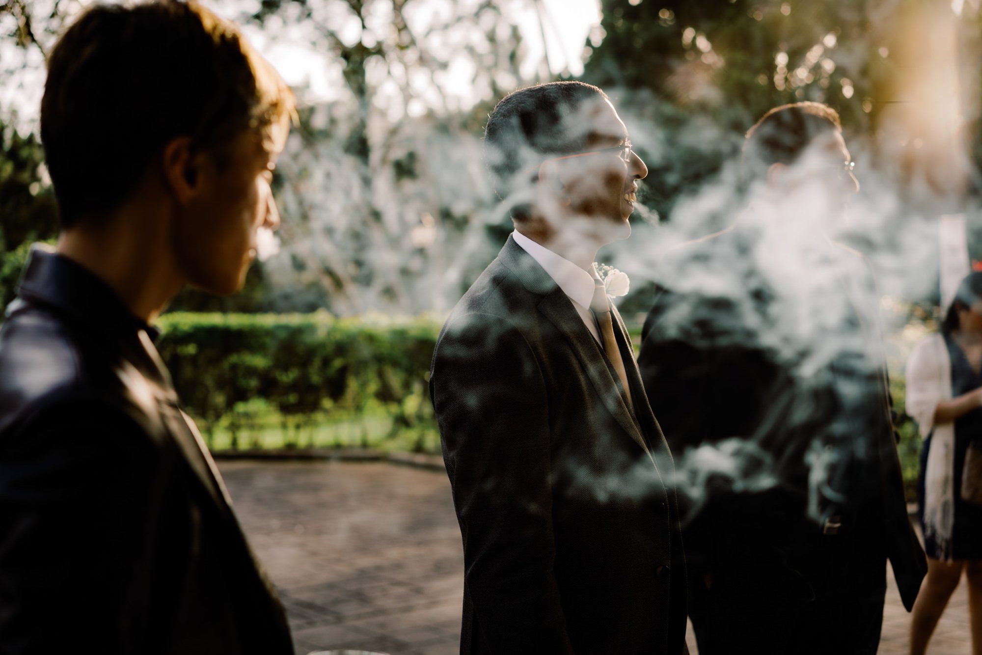 Dhillon having a smoke with his wedding guests