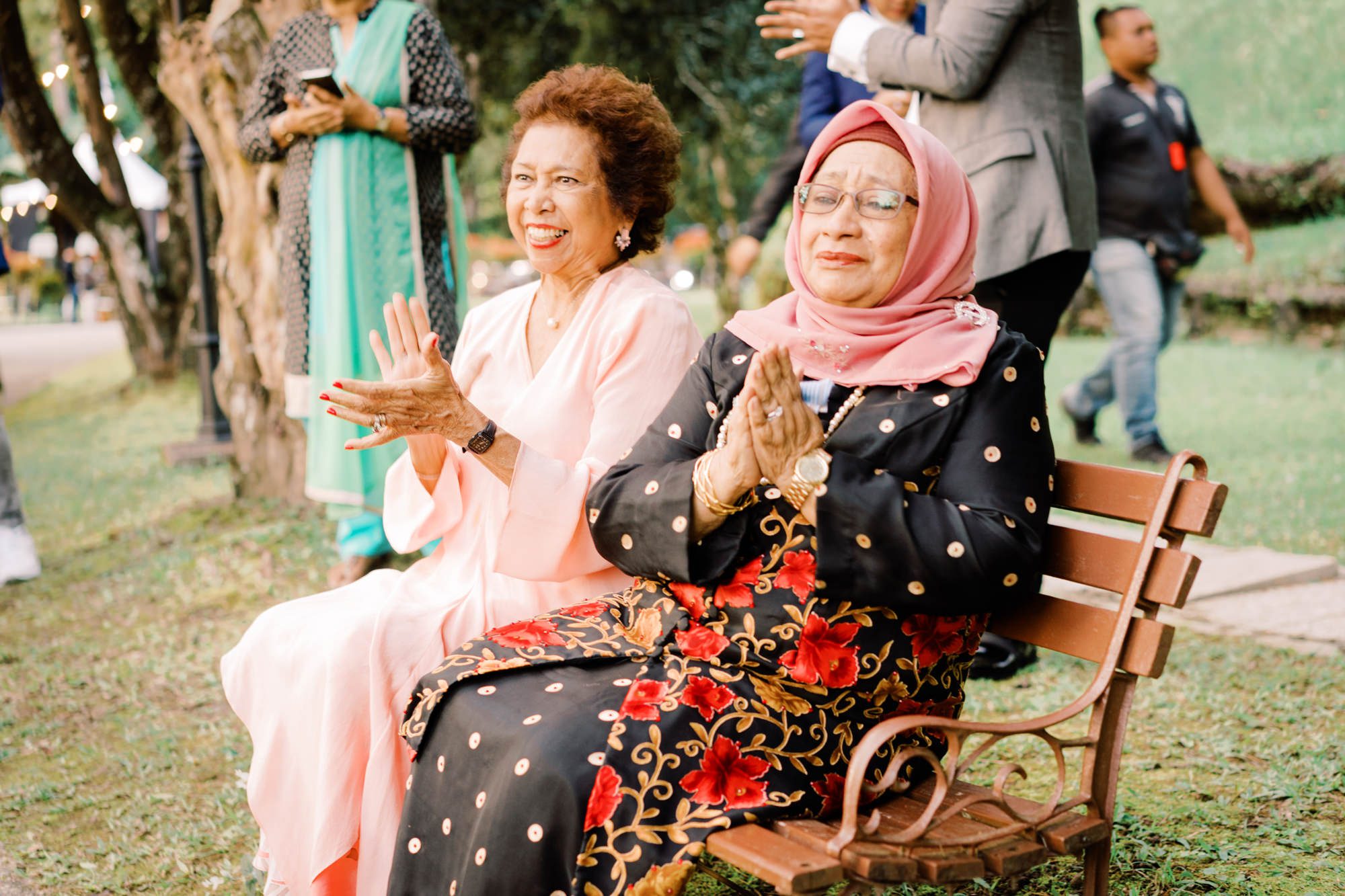 The moms clap in celebration