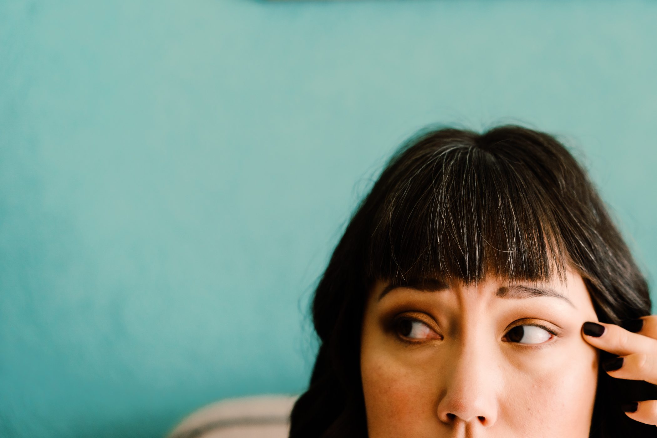 Bride Faythe getting her makeup done