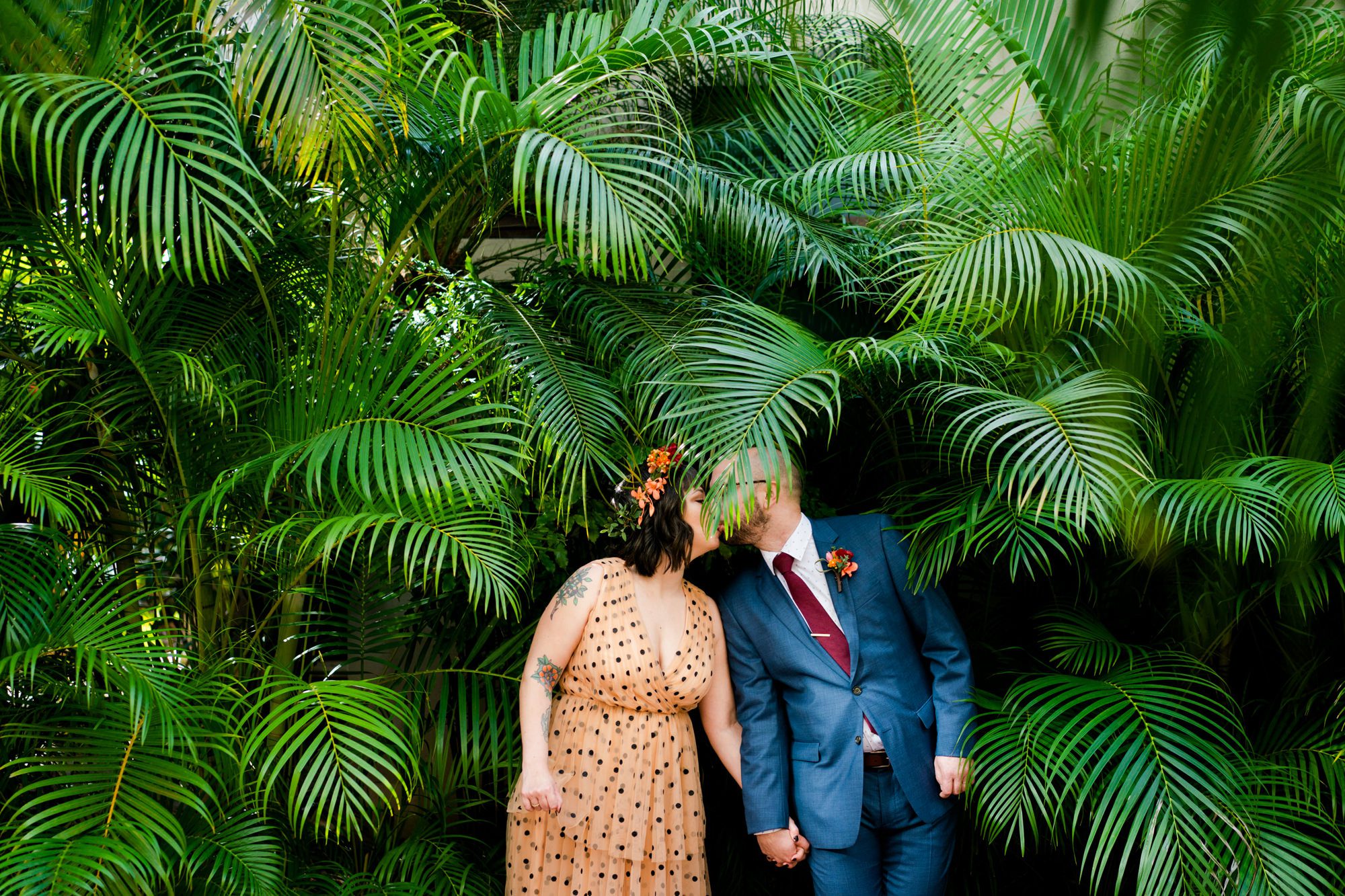 Faythe and Reid pose for wedding portraits