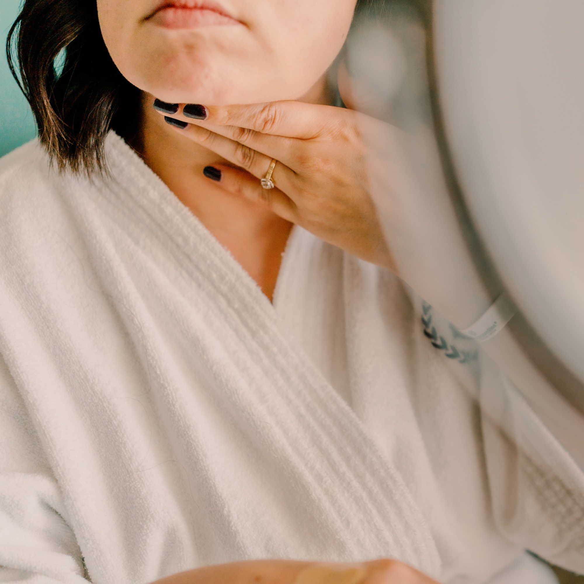 Bride Faythe getting her makeup done