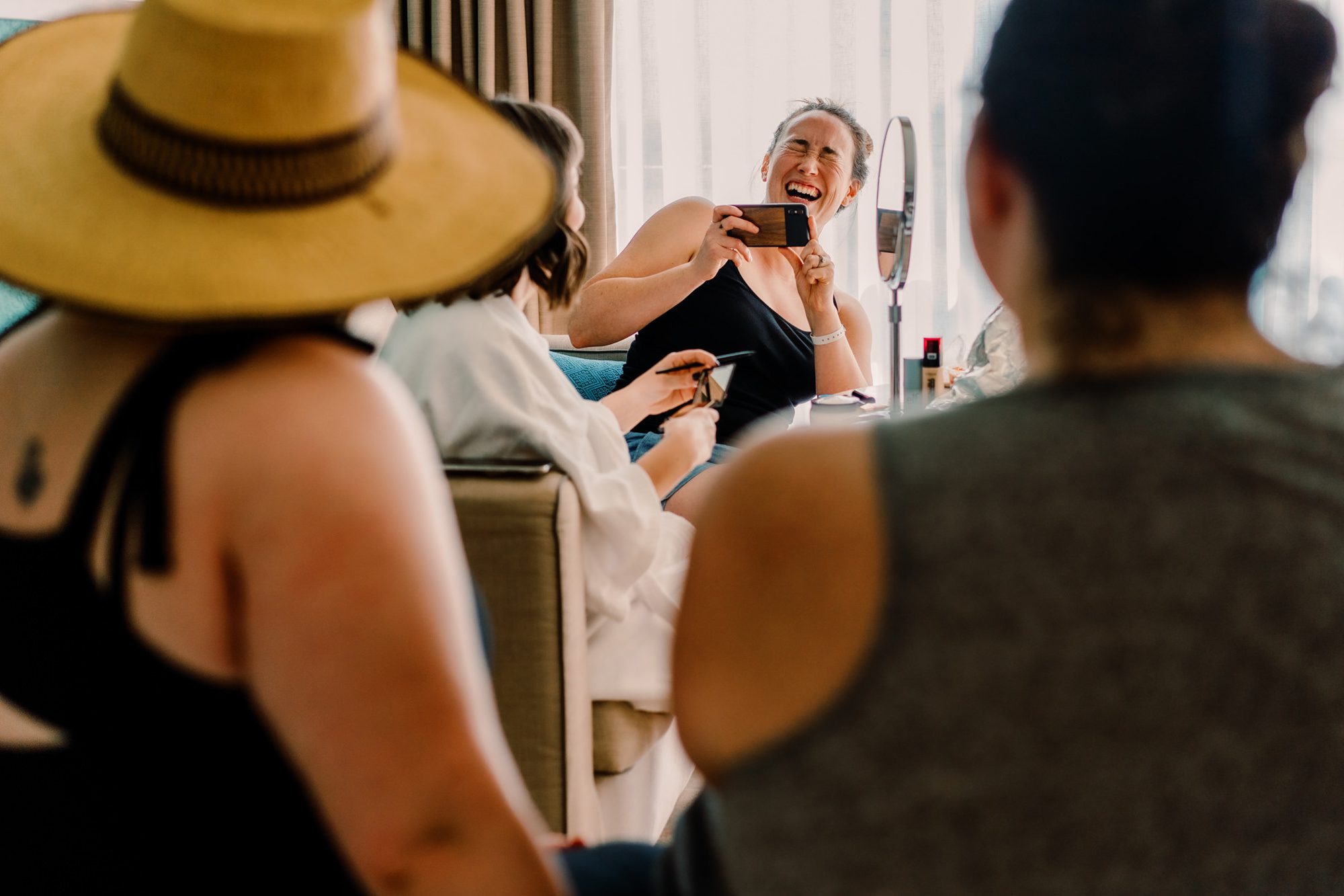 Sister of the bride Jenny laughing