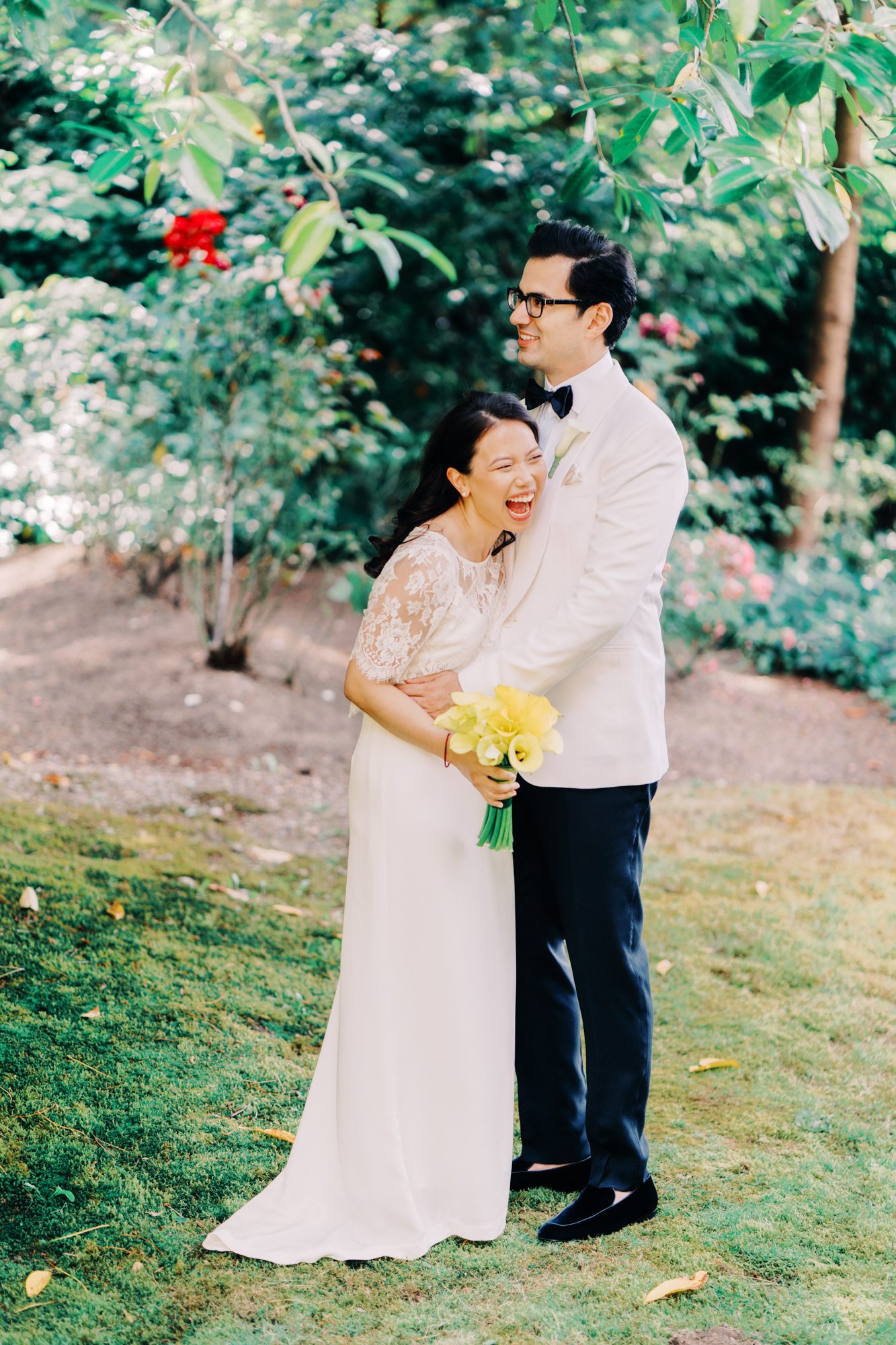 Jen and Sage pose for their wedding portraits