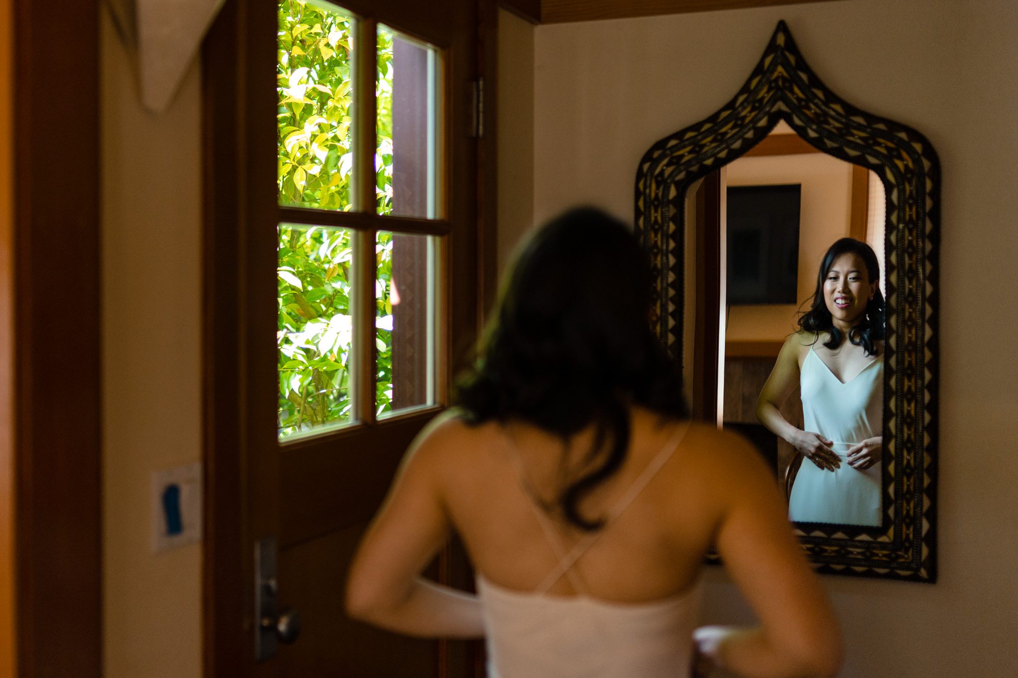 Jen getting her wedding gown on