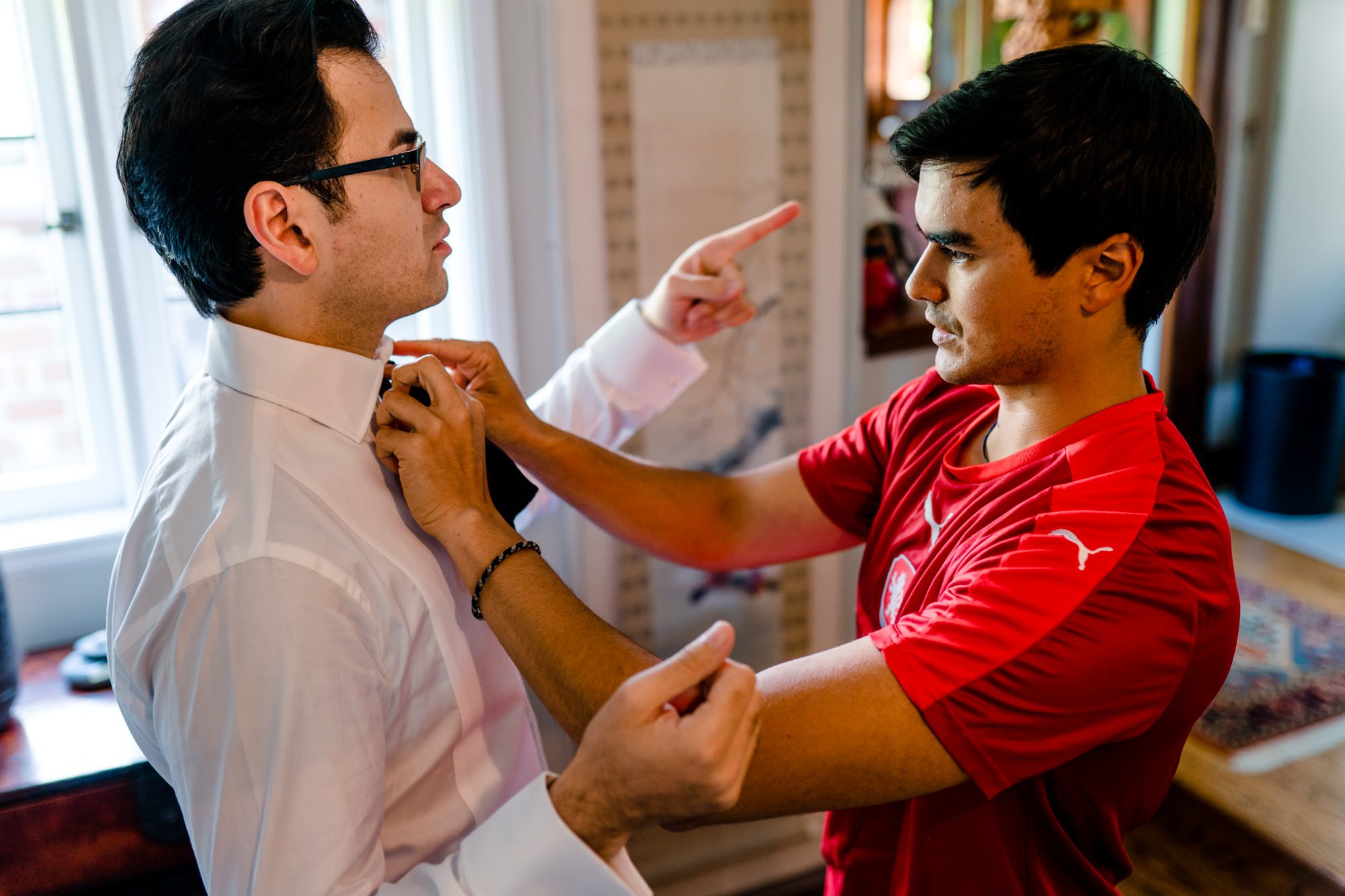 Sage's brother helps him with his bowtie 2