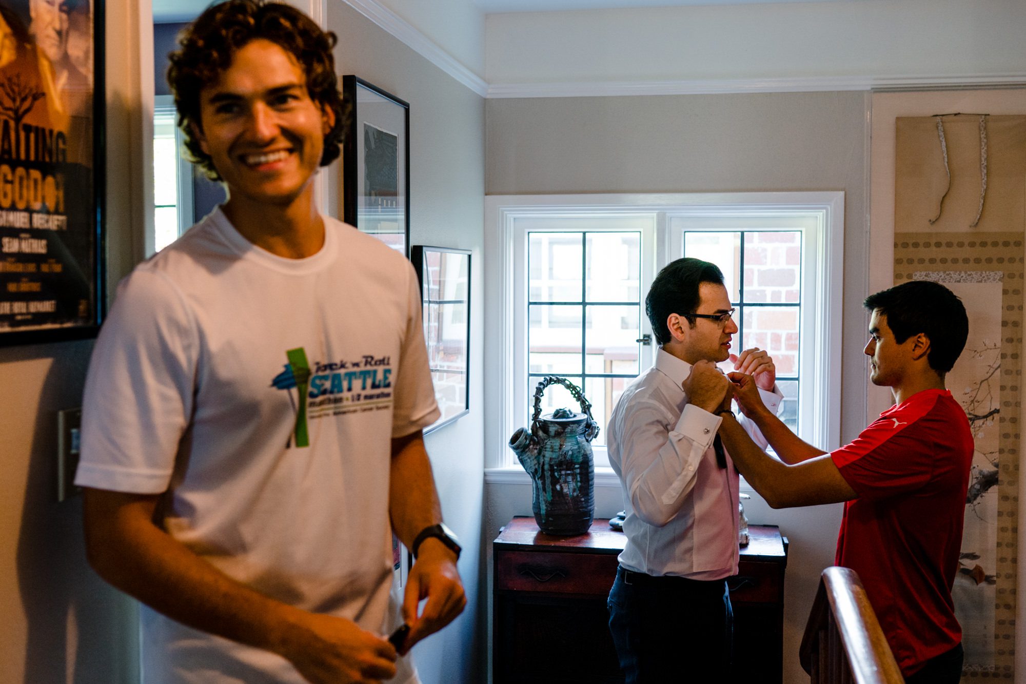 Sage's brother helps him with his bowtie