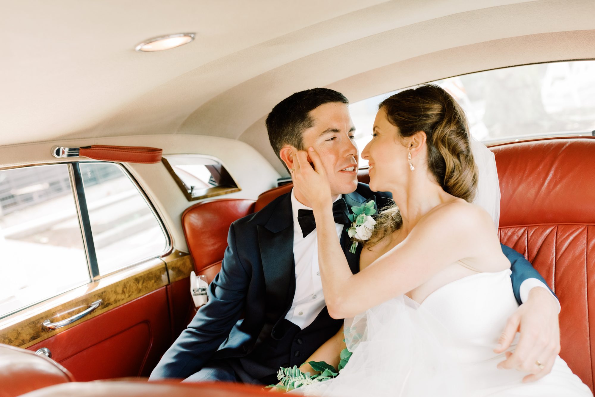 Seattle wedding photographer Jenn Tai: Tennie and Shane in British Motor Coach limo