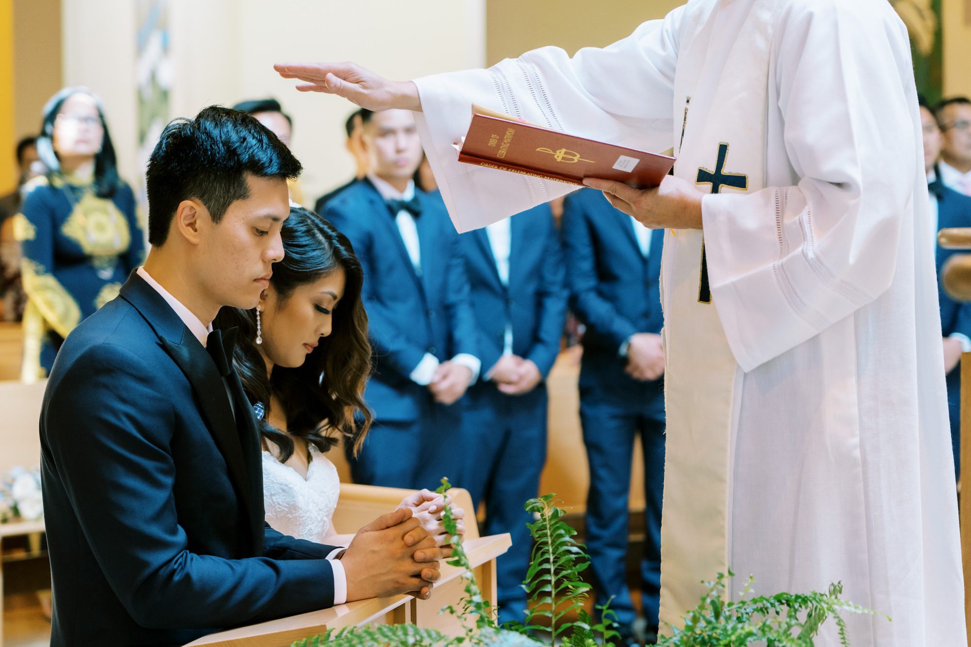 St Anne's Catholic Church wedding: Priest blessing