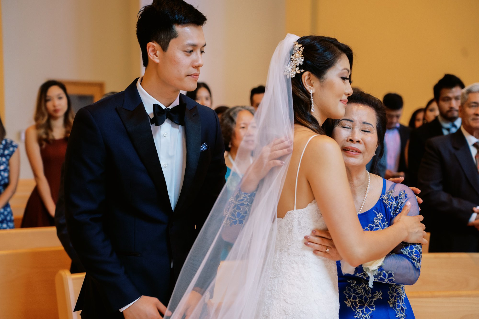St Anne's Catholic Church wedding: Bride hugs her mom