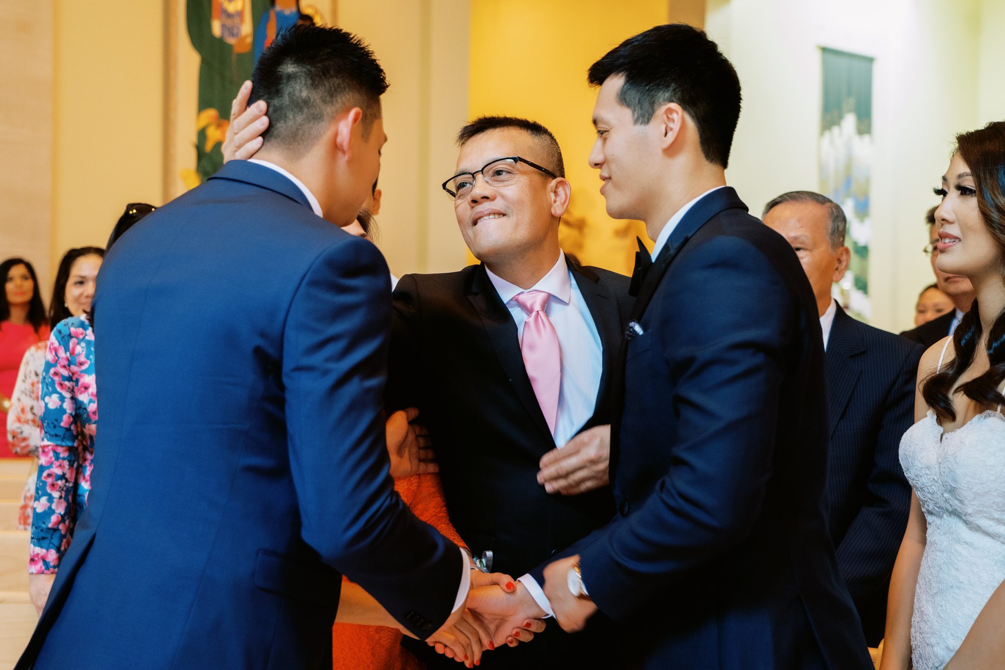 St Anne's Catholic Church wedding: Groom's dad hugs sons