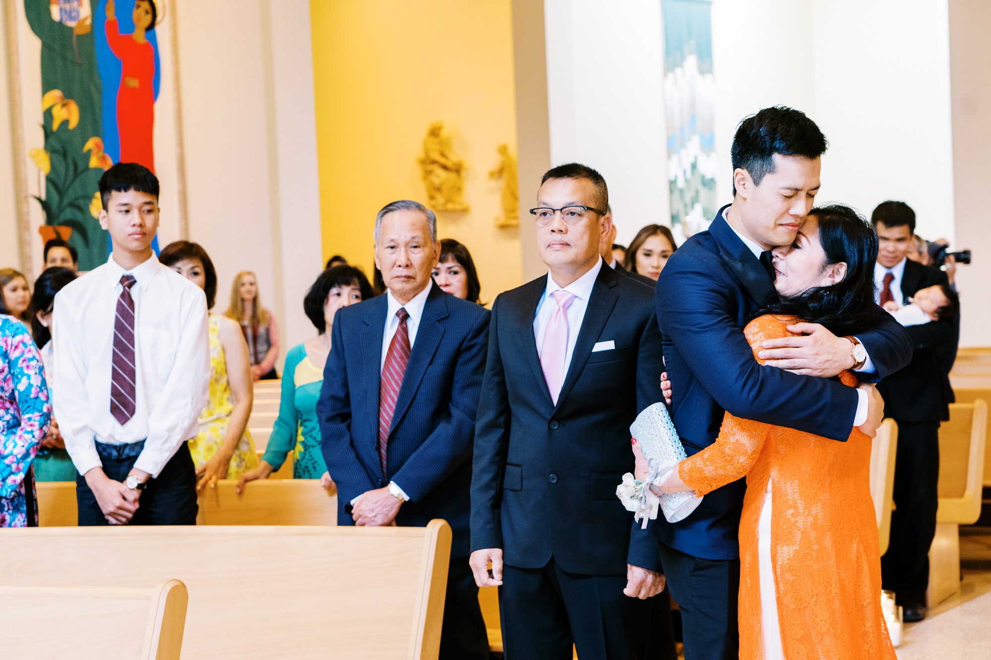 St Anne's Catholic Church wedding: Groom hugs his mom