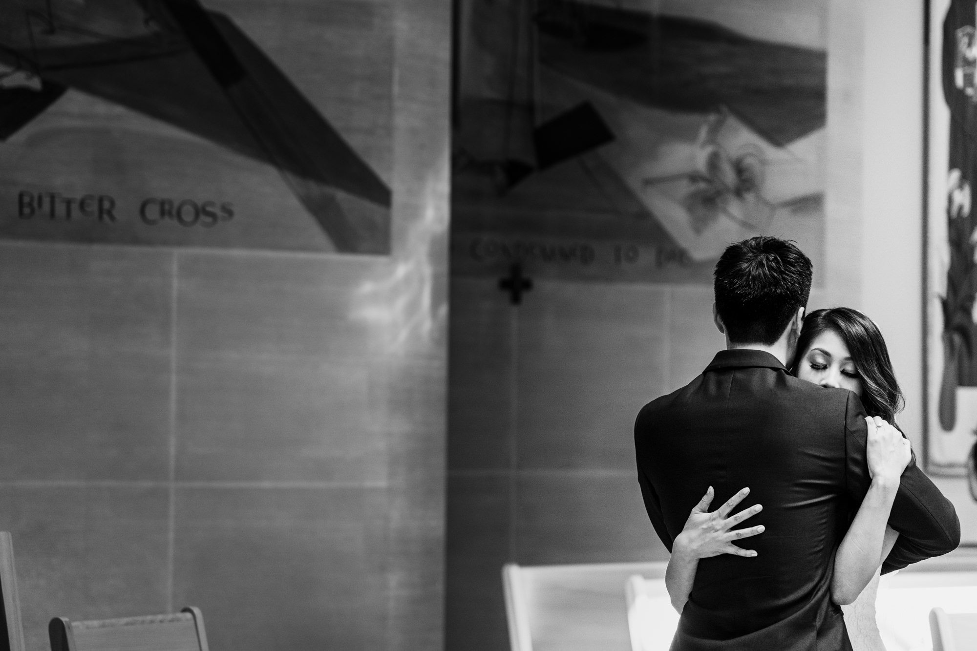 St Anne's Catholic Church wedding: Bride and groom hug
