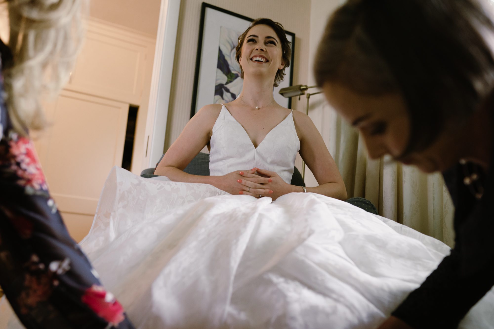 Bride Amy gets her shoes on