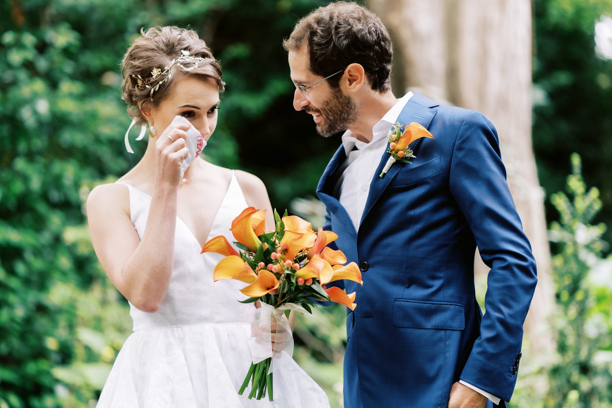 Seattle wedding photographers: Bride tears up during ceremony