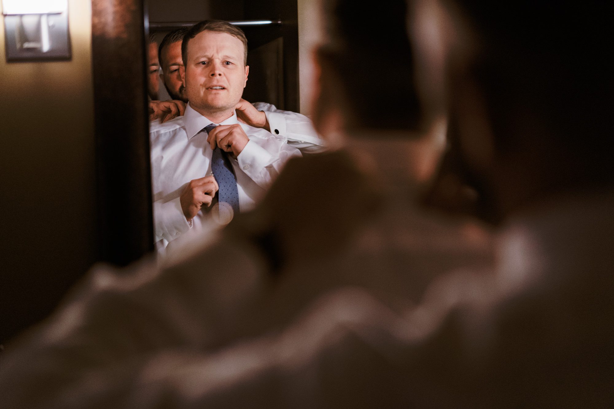 Seattle wedding photographer Jenn Tai: Brian getting ready
