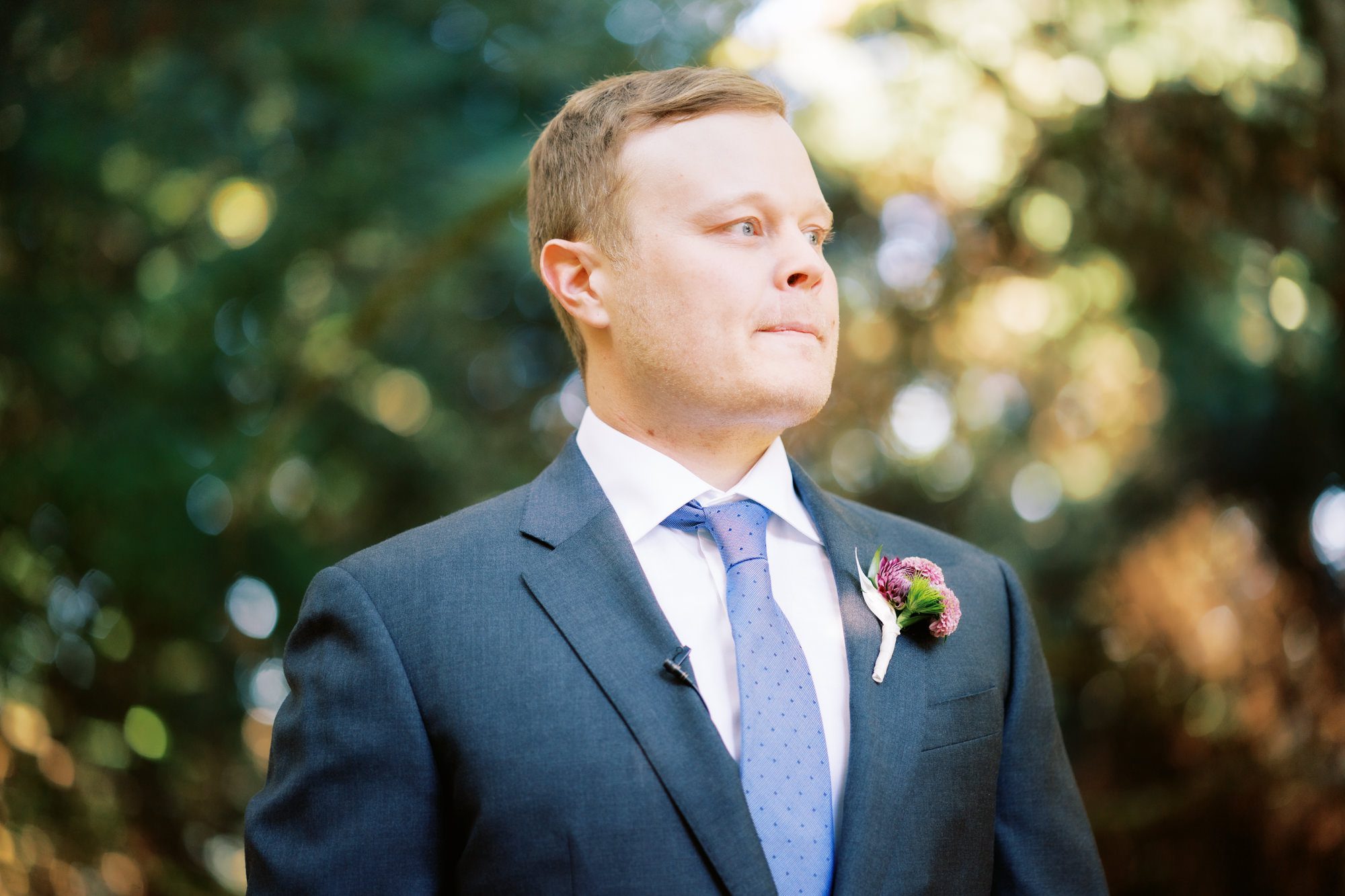 Woodinville wedding photographer Jenn Tai: Groom Brian waits at ceremony for his bride