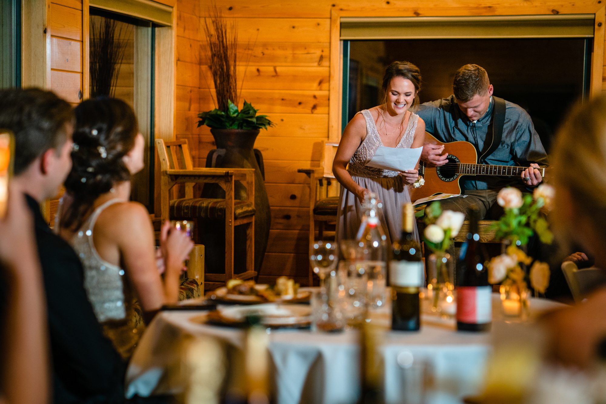 Fletcher and Veronica's friends sing them a song during toasts