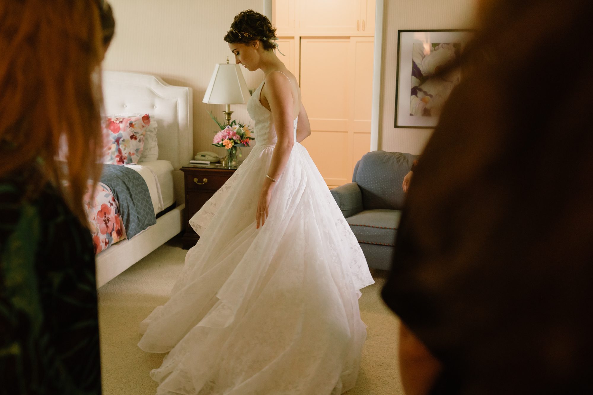 Amy swishes her dress for her friends