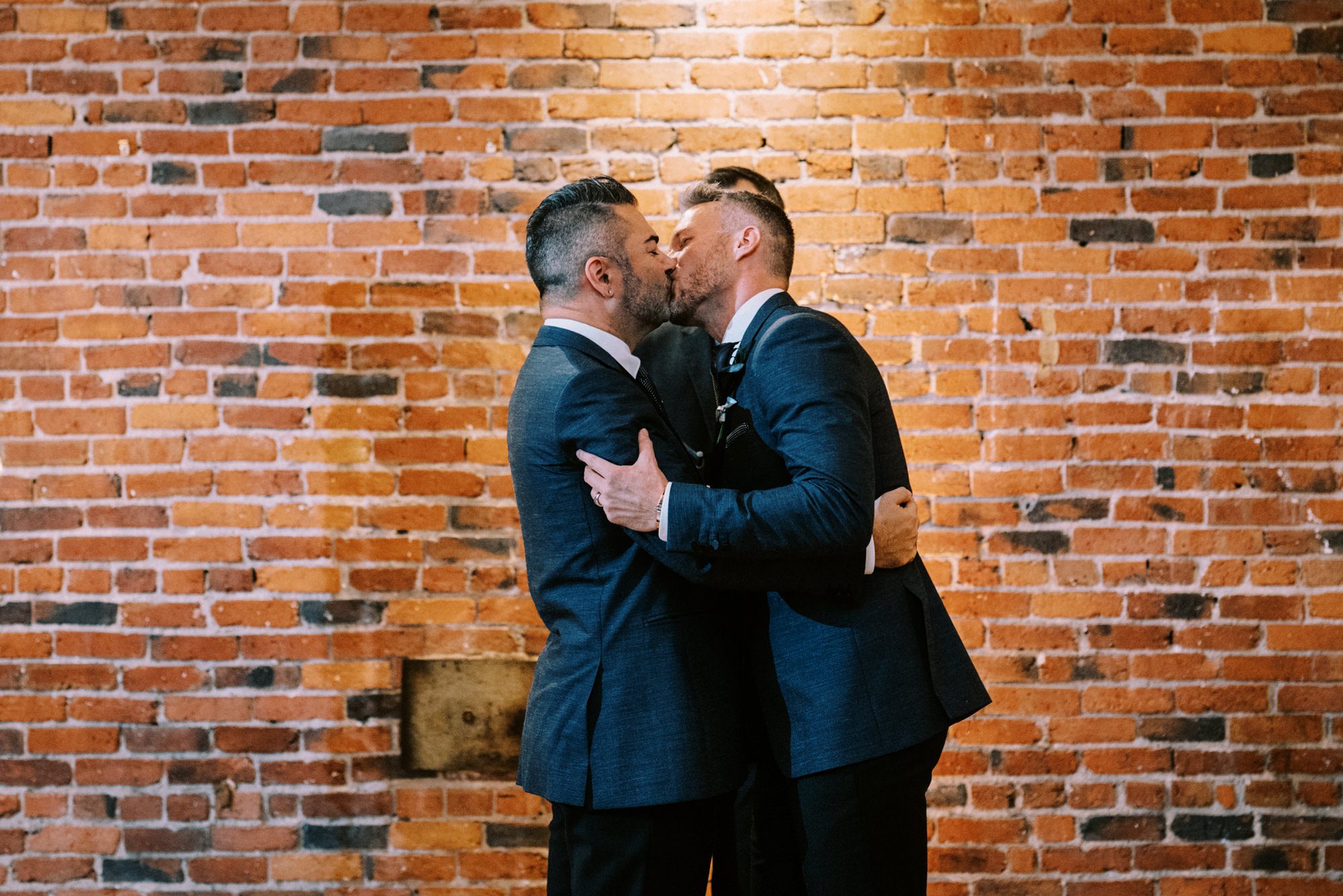 Married! Justin and Michael celebrate with a kiss. Married! Justin and Michael celebrate with a kiss.