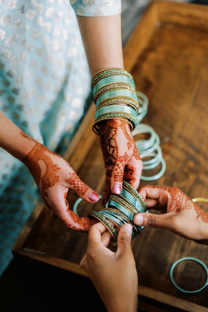 Amber wearing her Indian bangles for her wedding - Seattle Indian wedding photographer