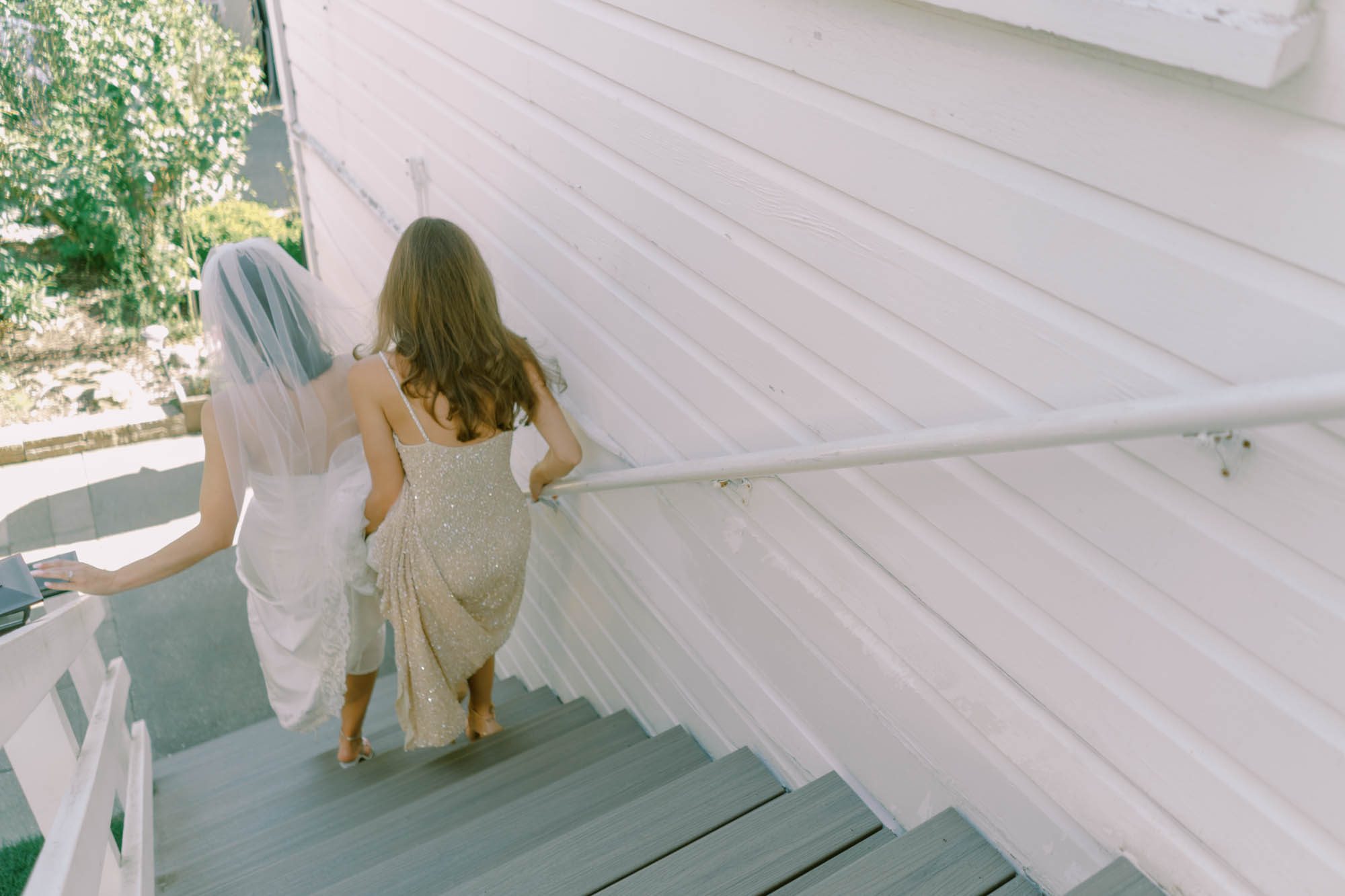 Alexa and her wedding party heads to her wedding ceremony at Belle Chapel