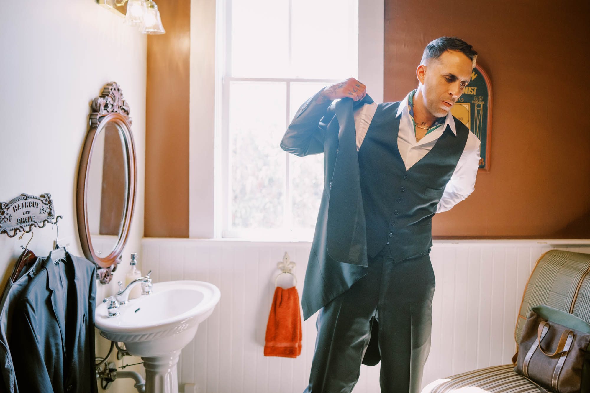 Groom Peter gets ready for his wedding at Belle Chapel, a Snohomish wedding venue