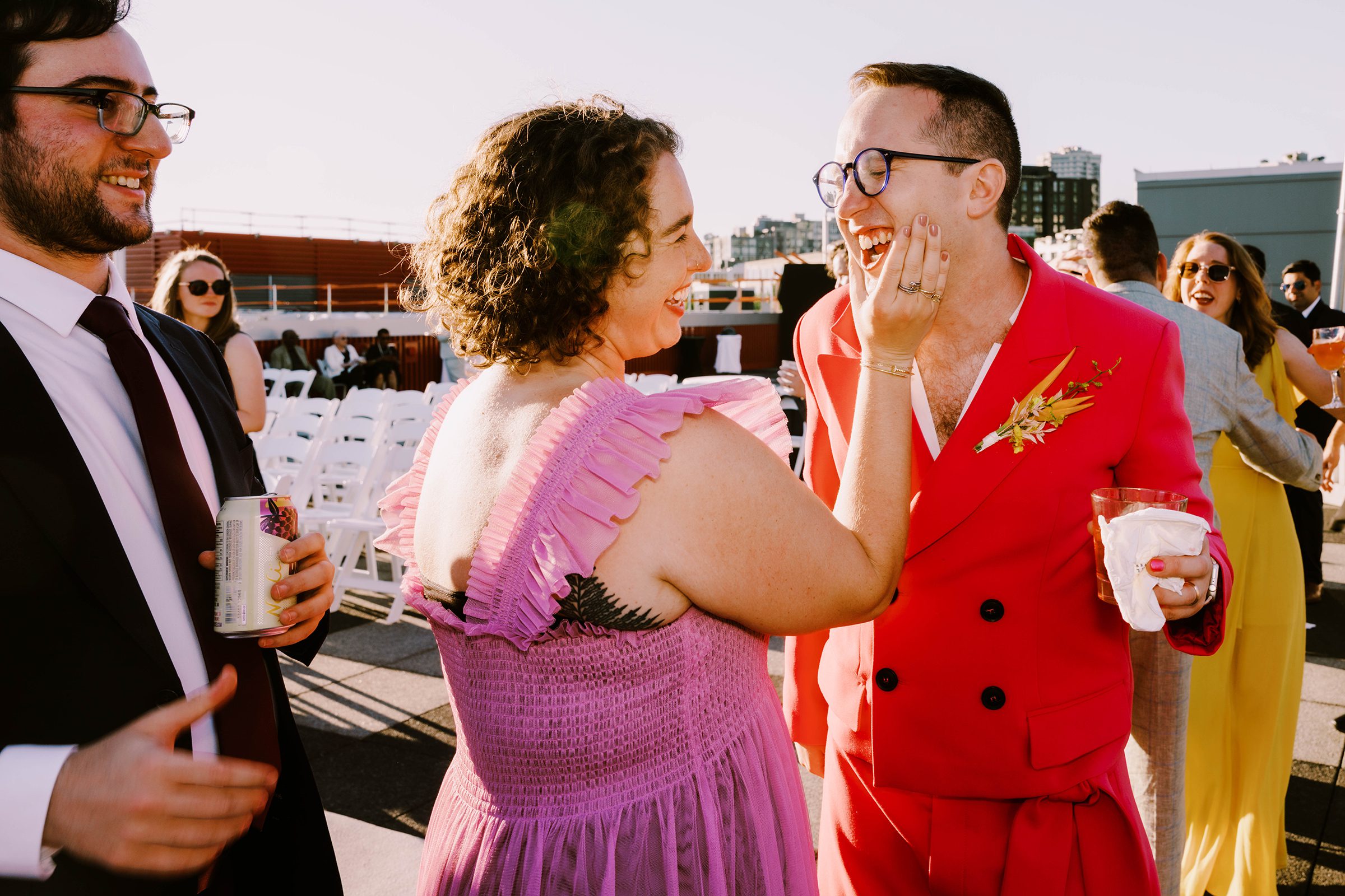 Dustin and Joey's wedding guests enjoying beautiful views on the Bell Harbor Conference Center rooftop, summer 2022