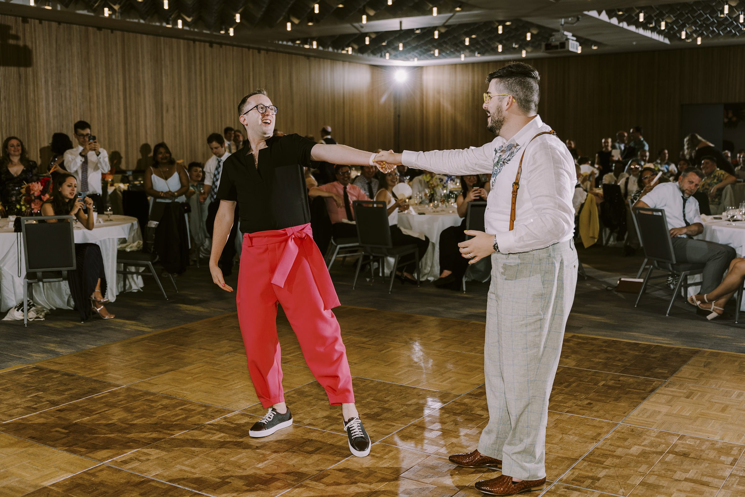 Joey and Dustin's first dance at their wedding reception at Bell Harbor Conference Center, summer 2022