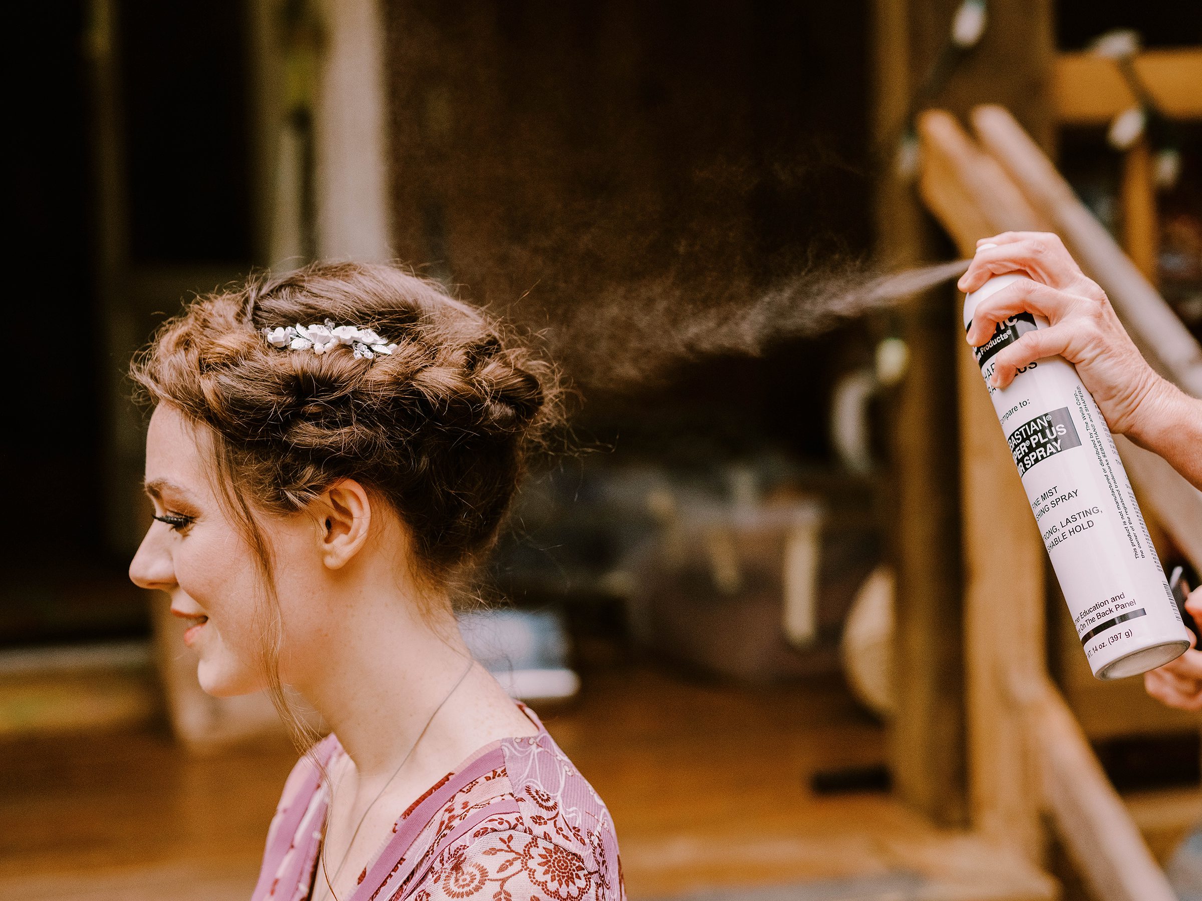 Annika getting her hair done by her friend